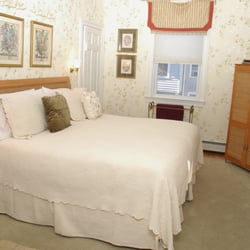 Inn on the Ocean - The Victorian Room with king bed and private bathroom.  Located on the first floor of the Inn on the Ocean.