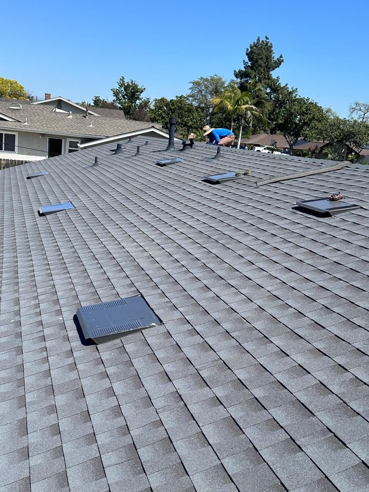Slide of Tecun’s Roofing