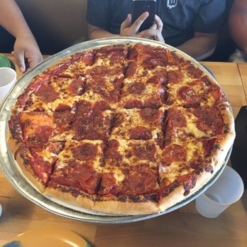 More Than Pizza - Pepperoni pizza cut into squares - Pizza Near Me - Fresno, California More Than Pizza - Pepperoni pizza cut into squares - Pizza Near Me - Fresno, California