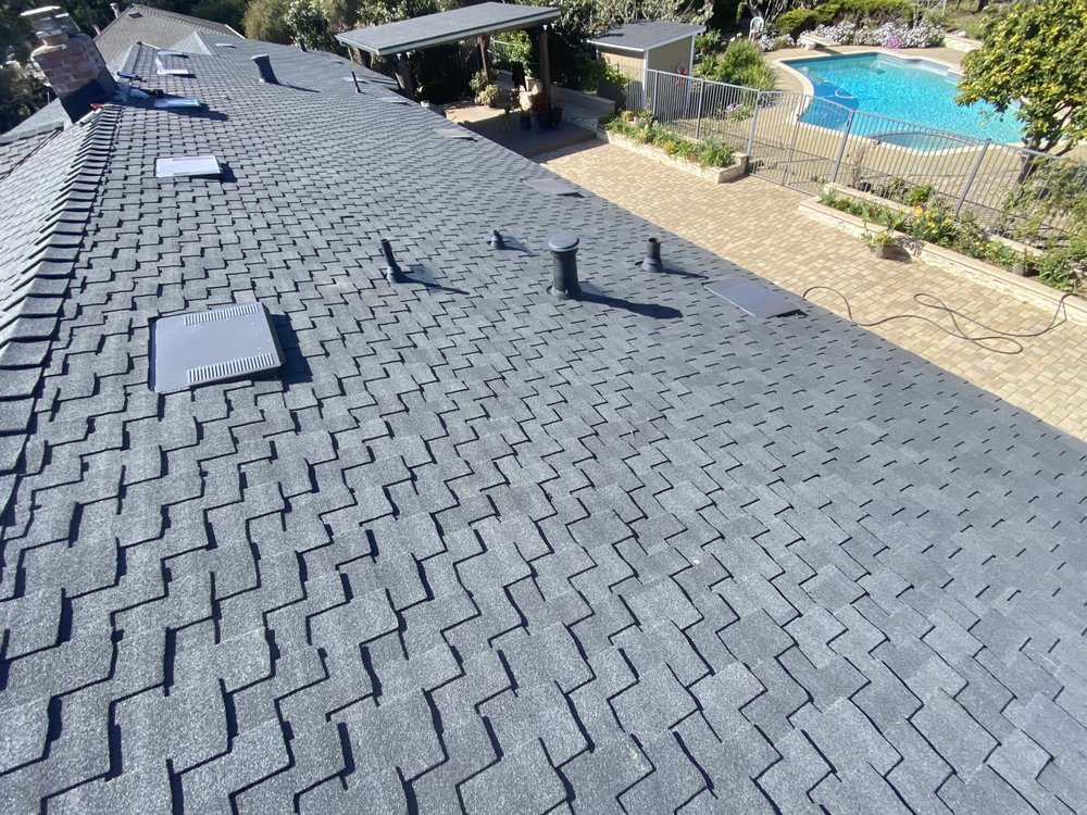 Slide of Luis Roofing