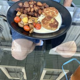 a man holding a plate of food