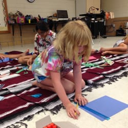 Some designs require precision. This camper is being very intentional with her work.