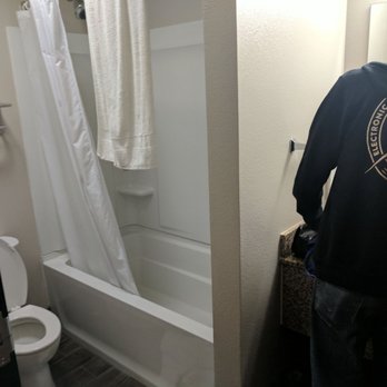 Oak Tree Inn - Here's the bathroom we had. I took the photo as we were checking out, so it's a bit messy. - Hotels Near Me - Glendive, Montana