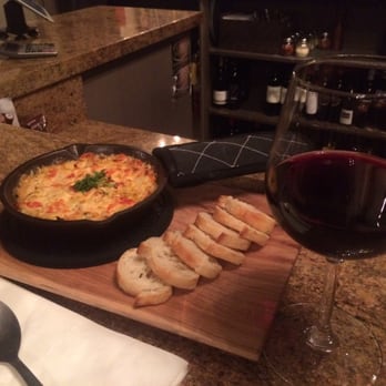 District Wine - My artichoke and pepper dip with my glass of old zinfindale/petite sirah - Wine Bars Near Me - Long Beach, California District Wine - My artichoke and pepper dip with my glass of old zinfindale/petite sirah - Wine Bars Near Me - Long Beach, California