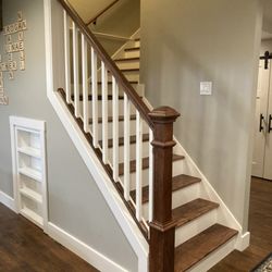 New stair case with Murphy door to storage area