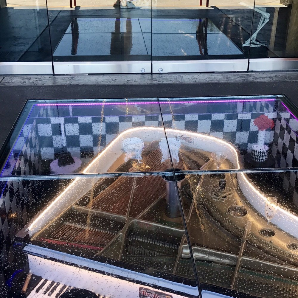 Big Rock Pub - Nutty piano player under the entrance. Pretty cool - American Near Me - Indio, California