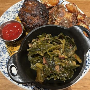 Tupelo Honey Southern Kitchen & Bar - Bourbon Glazed Meatloaf with sides of collard greens and fried potatoes - Southern Near Me - Myrtle Beach, South Carolina