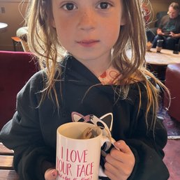 One of the many unique mugs sold at Crema