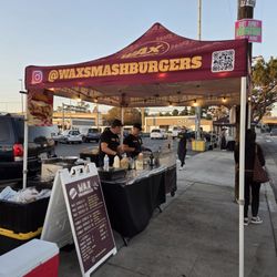 WAX Smash Burgers - Outside, corner of National and Sawtelle. Sometimes more on the National Blvd side.