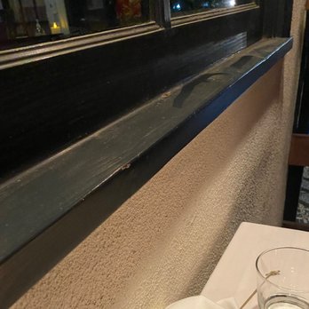 Terra e Mare - Dirty window sill we were seated next to on the patio at Terre e Mare on February 5, 2022. - Steakhouses Near Me - Los Angeles, California Terra e Mare - Dirty window sill we were seated next to on the patio at Terre e Mare on February 5, 2022. - Steakhouses Near Me - Los Angeles, California