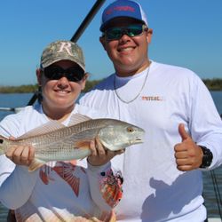 Local Waters - Ronni with her first ever redfish. Fish Local Waters!