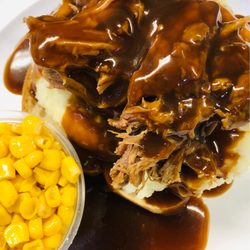 BROZ BAR - OPEN FACED HOT BEEF DINNER WITH MASHED POTATOES AND GRAVY WITH A SIDE OF WHOLE KERNAL CORN
