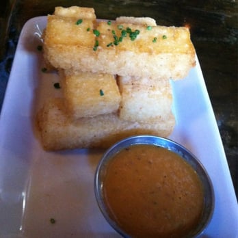 Tupelo - Grit cakes w/ smoked tomato vinaigrette - Southern Near Me - San Francisco, California Tupelo - Grit cakes w/ smoked tomato vinaigrette - Southern Near Me - San Francisco, California