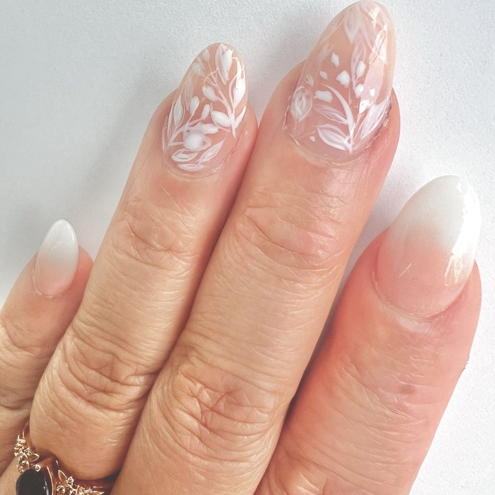 balayage white & pink, with floral design on 2 accent nails.