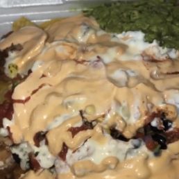 Nachos w/ TBB, queso, chipotle sour cream, salsa, pico, sour cream, guac, corn salsa, beans, chicken Nachos w/ TBB, queso, chipotle sour cream, salsa, pico, sour cream, guac, corn salsa, beans, chicken