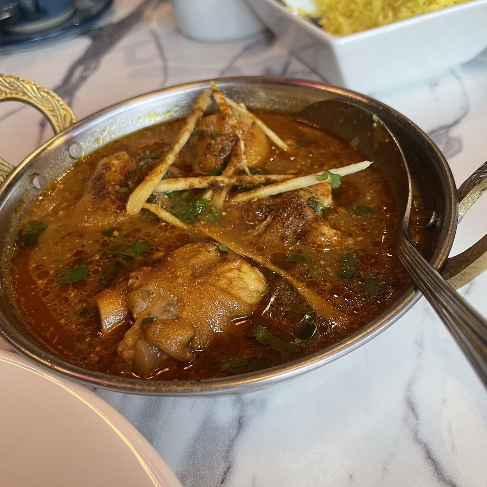 Sofi'z Kitchen & Bar - Goat Paya Curry (goat hoof bone broth) this bone marrow soup is full of richness and a depth of flavorful spices that warms the soul. - Pakistani Near Me - Chico, California Sofi'z Kitchen & Bar - Goat Paya Curry (goat hoof bone broth) this bone marrow soup is full of richness and a depth of flavorful spices that warms the soul. - Pakistani Near Me - Chico, California