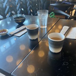 two cups of tea on a table two cups of tea on a table