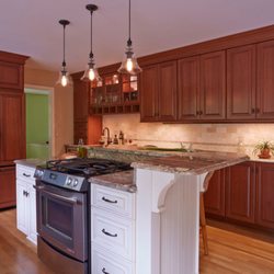 Kona Cabinetry & Design - Rich wood with a light accent island in our custom series.