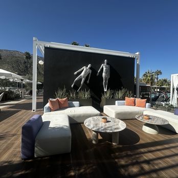 Thompson Palm Springs - Lounge area available to the public , just outside the gated pool area - Hotels Near Me - Palm Springs, California Thompson Palm Springs - Lounge area available to the public , just outside the gated pool area - Hotels Near Me - Palm Springs, California