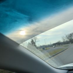 Garry's & Rob's Custom Interiors & Window Tinting - Front windshield tinted strip. Love it. It's perfect for when the sun gets in the smallest places your visors don't block.