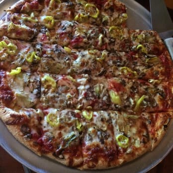 Martini's Pizza - The best pizza in Kalamazoo! This one has banana peppers, mushrooms, sausage, artichokes and of course cheese on it! Delicious - Pizza Near Me - Kalamazoo, Michigan Martini's Pizza - The best pizza in Kalamazoo! This one has banana peppers, mushrooms, sausage, artichokes and of course cheese on it! Delicious - Pizza Near Me - Kalamazoo, Michigan