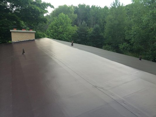PVC membrane roof - This was a complete tear off and installation of 0.080mil PVC roof membrane in brown.