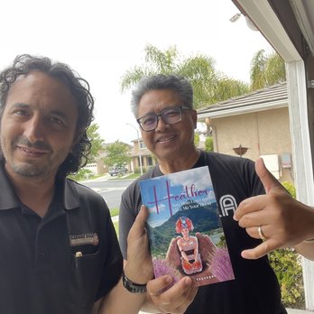 Garage Door Medics - Avi (left) of Garage Door Medics, and Steve, five year loyal customer. - Garage Door Services Near Me - San Diego, California Garage Door Medics - Avi (left) of Garage Door Medics, and Steve, five year loyal customer. - Garage Door Services Near Me - San Diego, California