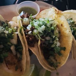 Osorio Tacos - shrimp on the sides and chorizo in the middle Osorio Tacos - shrimp on the sides and chorizo in the middle