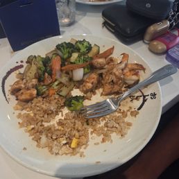 Half eaten chicken and shrimp hibachi. Half eaten chicken and shrimp hibachi.