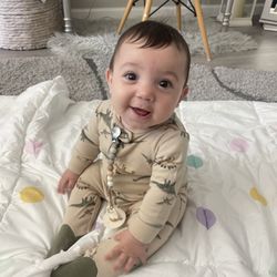 Our littlest Angel! AND his Daddy graduated from The Village childcare over 20 years ago!