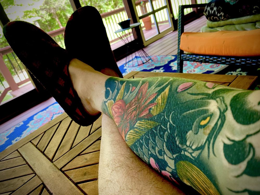 Messenger Tattoo Studio Logo