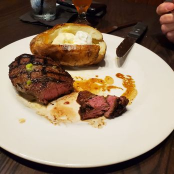 Local Goat - 10oz sirloin with loaded baked potato - New American Near Me - Pigeon Forge, Tennessee