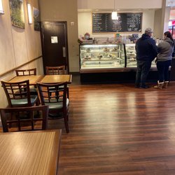 Electric City Roasting Company - The guy without a name tag who couldn't seem to stop sighing with every order on my brother's transaction. (Not Joe. Joe was nice).