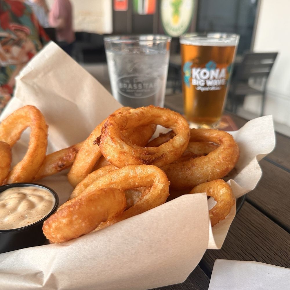 The Brass Tap - Onion rings with filling sauce (good with the fish too) - Beer Bar Near Me - Richmond, Texas The Brass Tap - Onion rings with filling sauce (good with the fish too) - Beer Bar Near Me - Richmond, Texas