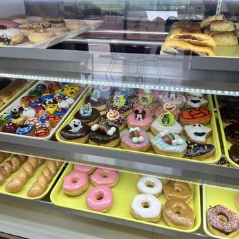 J Donuts - a variety of doughnuts in a display case - Donuts Near Me - Watauga, Texas