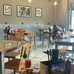 Pho restaurant with tables and decor. Pho restaurant with tables and decor.