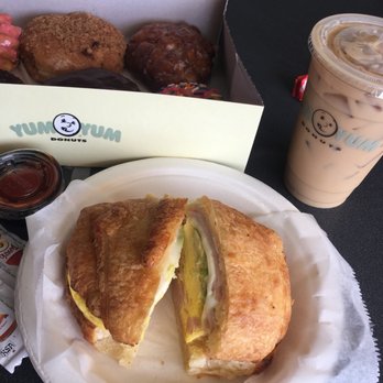 Yum Yum Donuts - Ham, egg, cheese and avocado breakfast Croissant. French vanilla iced coffee. And half a dozen donuts. - Donuts Near Me - San Diego, California