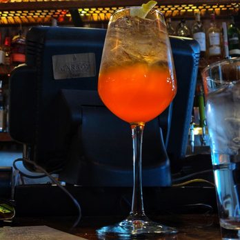 Angelo’s Taverna - aperol spritz at the bar - Italian Near Me - Denver, Colorado Angelo’s Taverna - aperol spritz at the bar - Italian Near Me - Denver, Colorado