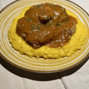 Posto di Conversazione - Osso Bucco over saffron risotto - Italian Near Me - Milan, Michigan Posto di Conversazione - Osso Bucco over saffron risotto - Italian Near Me - Milan, Michigan