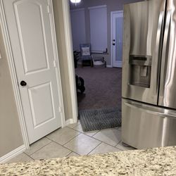 Best Buy - Fridge partially blocking entry to other room