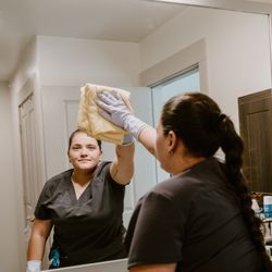 Kismet Pros - One of our dedicated service pros creating a sparkling bathroom