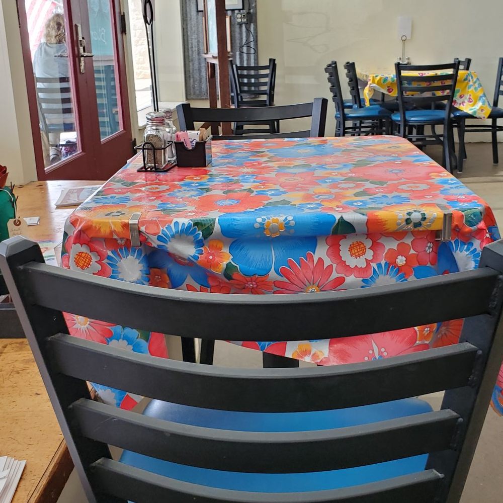 Redbud Cafe - Every table was covered with a different piece of Mexican oilcloth fabric. It was too cute! - Cafes Near Me - Blanco, Texas Redbud Cafe - Every table was covered with a different piece of Mexican oilcloth fabric. It was too cute! - Cafes Near Me - Blanco, Texas