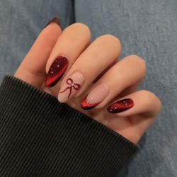 BonLierre Nail Spa - Cat eyes nail with red bow