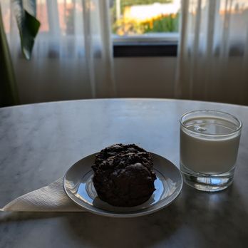 Muffin Girl - Just enjoying our brownie cookie with a glass of milk! - Cupcakes Near Me Muffin Girl - Just enjoying our brownie cookie with a glass of milk! - Cupcakes Near Me