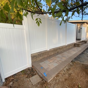 Alpine Fence - New fence on new construction raised retaining wall.  Connected to existing fencing. - Fences & Gates Near Me - Alpine, California