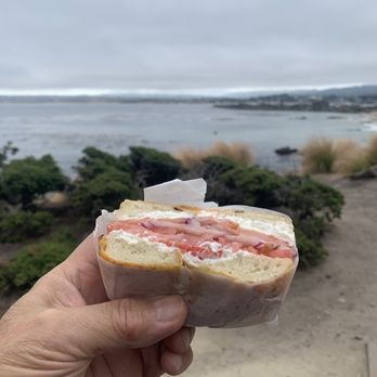 The Bagel Bakery - smoked salmon and cream cheese on jalapeño cheese bagel. eaten by the bay. - Coffee & Tea Near Me - Monterey, California The Bagel Bakery - smoked salmon and cream cheese on jalapeño cheese bagel. eaten by the bay. - Coffee & Tea Near Me - Monterey, California