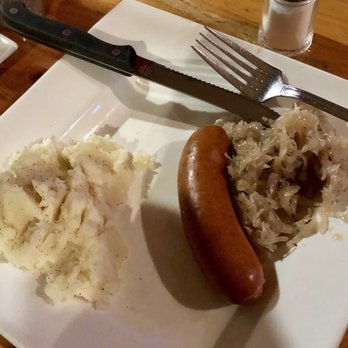 Steins - Bratwurst plate (sorry the second sausage already moved to another plate for sharing). Delicious potatoes & great sauerkraut - German Near Me - San Francisco, California Steins - Bratwurst plate (sorry the second sausage already moved to another plate for sharing). Delicious potatoes & great sauerkraut - German Near Me - San Francisco, California