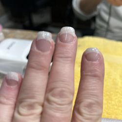 Exquisite Nails - He attempted to fix them and made them look worse