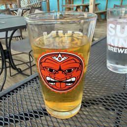 The new lemon shandy (so good!) on a table outside
