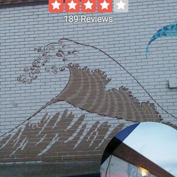 Blue Fish - Outside art painting on a brick wall. - Japanese Near Me - Ocean City, Maryland